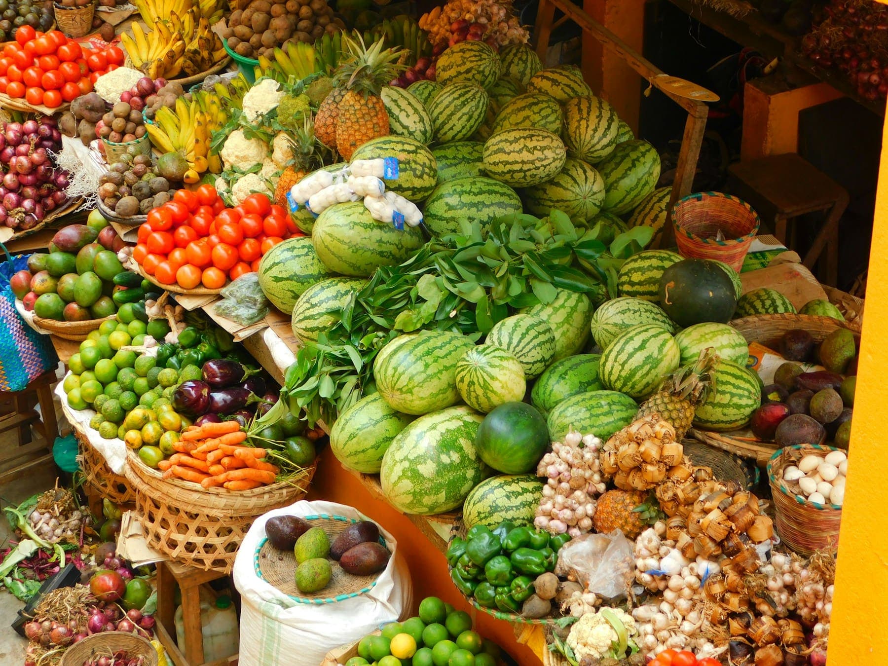 Abundant fresh fruit and vegetables at an outdoor market